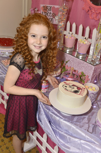 Sweets for a Sweetie: 10-year-old actress Francesca Capaldi was sweet on the beautiful Snoopy and Belle Valentine’s cakes at her pre-Valentine’s party. You can make this same cake using the Park Hyatt’s recipe, and if you win my giveaway, one of the delicious DecoPac Snoopy or Belle toppings will be included!